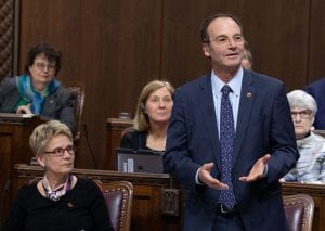 FRENCH: Le sénateur Marc Gold addresse le Sénat pour la première fois en tant que représentant du gouvernement au Sénat le 4 février 2020. La sénatrice Raymonde Gagné, coordonnatrice législative, est assise à sa gauche, et la sénatrice Patti LaBoucane-Benson, agente de liaison, est assise derrière elle.